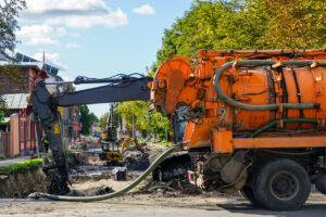 Excavator Types and Uses: Full Breakdown for Contractors 5 Orange Suction Excavator