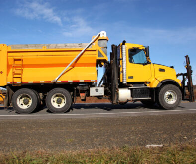 Yellow Iron Yellow Dumptruck on Road