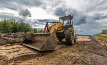 Skid steer working on a construction site