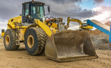 Yellow construction vehicle on site