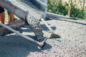 Concrete Trucks in Construction: Types Uses and Costs 3 Concrete being poured on construction site