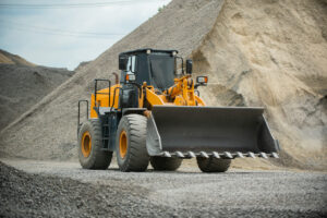 Large wheel loader on gravel site