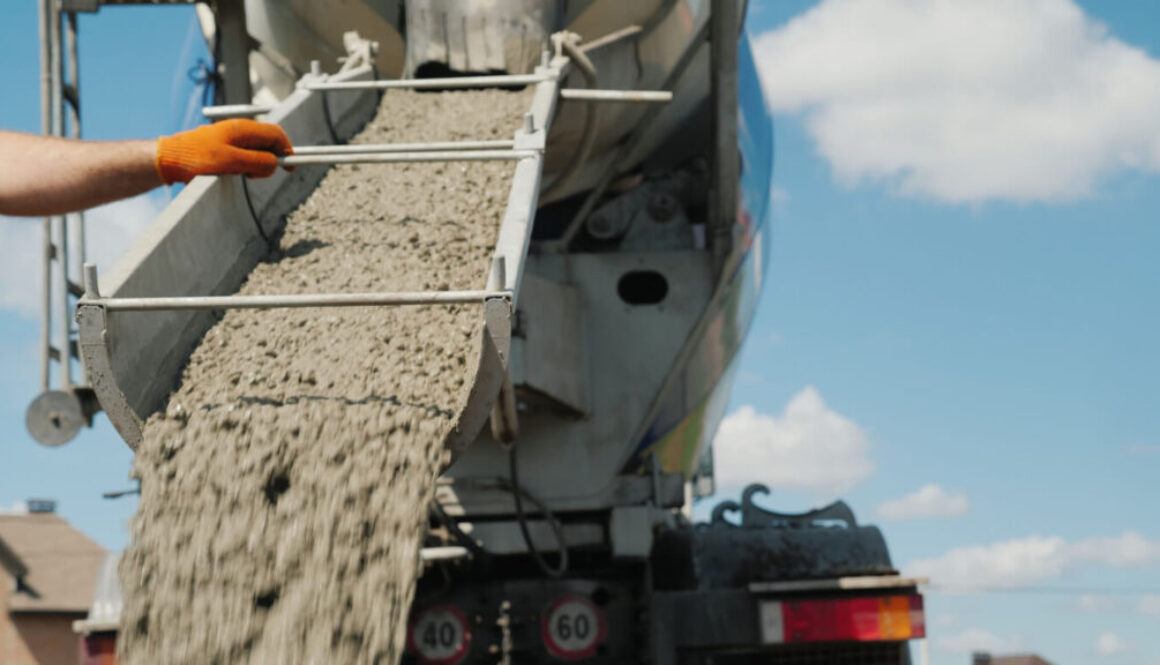 Concrete being poured from truck