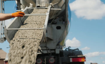 Concrete being poured from truck