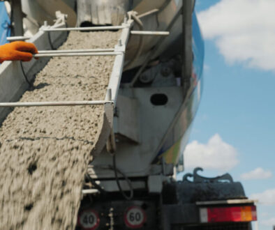 Concrete being poured from truck